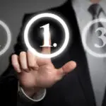 Lawyer discussing legal documents with a client, symbolizing professional legal consultation.