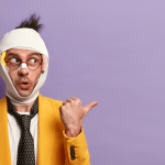 Confused man with bandages pointing sideways — how do you get a car after a car accident
