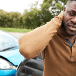 Man experiencing neck pain after car accident wondering will insurance cover if I hit another car