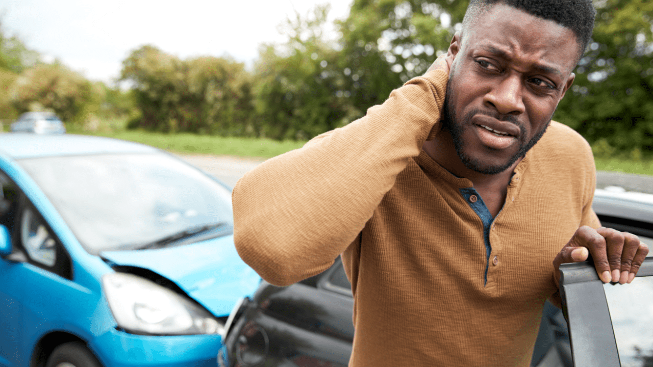 Man experiencing neck pain after car accident wondering will insurance cover if I hit another car