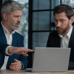 Two attorneys discussing how to pivot SEO strategy law firm slow results during strategic consultation meeting