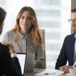 Legal marketing team discussing effective marketing strategies for bankruptcy lawyers in corporate meeting