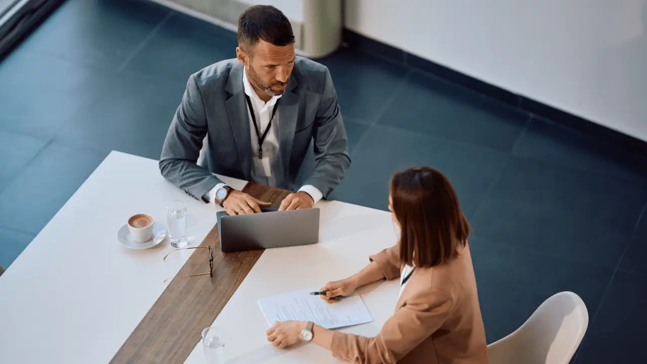 Business professionals evaluating best leads for bankruptcy during consultation meeting in modern office