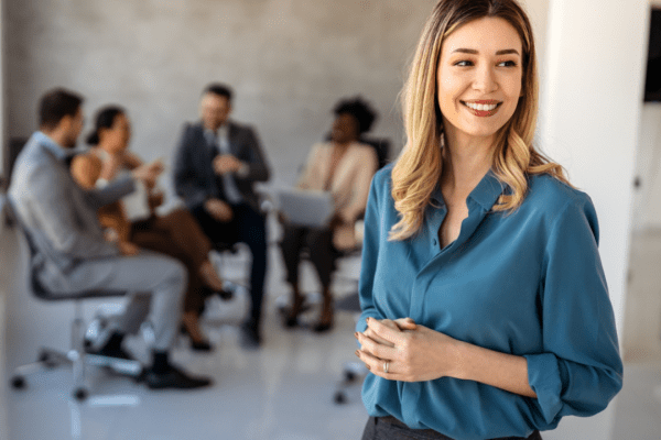 Professional attorney in law office discussing law firm client acquisition SEO strategies with legal marketing team