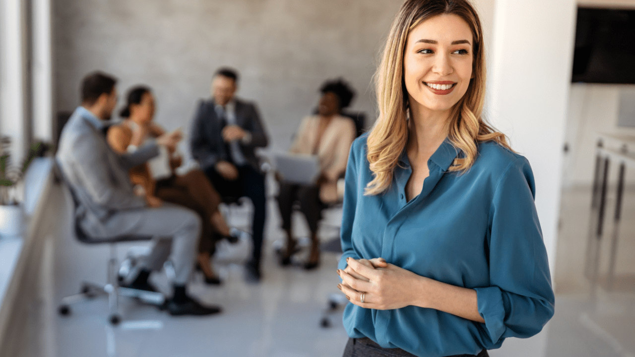 Professional attorney in law office discussing law firm client acquisition SEO strategies with legal marketing team