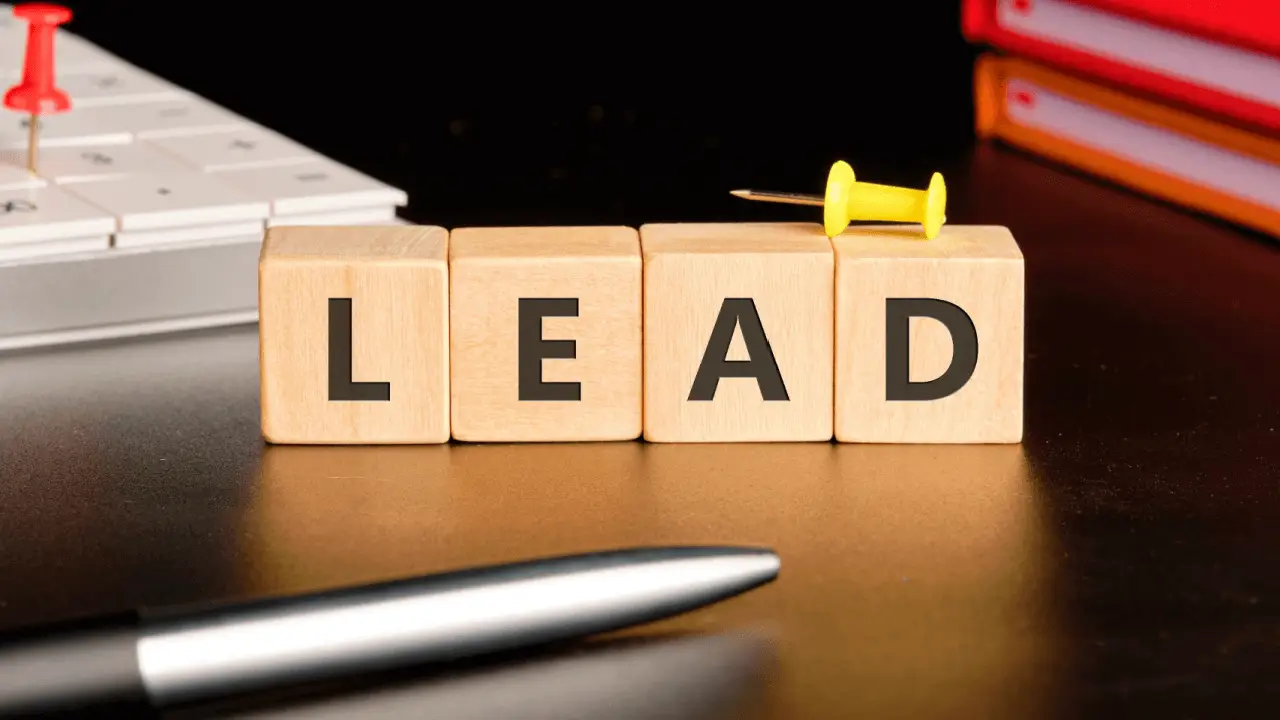 Legal lead generation SEO concept with LEAD wooden blocks on attorney desk with calendar and files