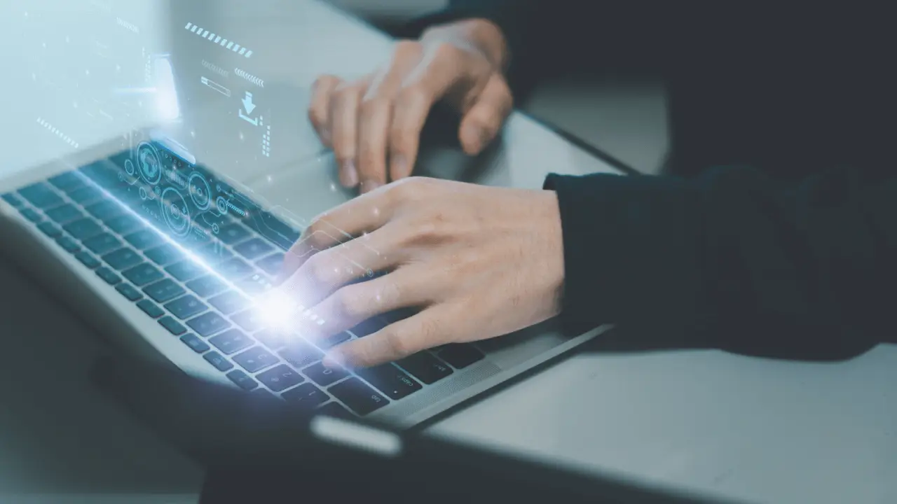 Practice area keyword intent research with professional typing on laptop showing digital analytics interface