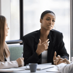 Practice area SEO leads consultation with attorney and clients discussing legal marketing strategies