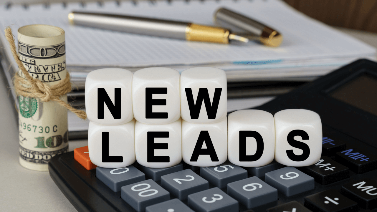 SEO for legal leads concept with new leads text on calculator and money representing law firm client acquisition