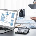 Legal SEO framework strategy session with digital marketing wireframes and analytics data on laptop for law firm optimization