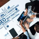 Legal professionals analyzing online reputation SEO for law firms data and analytics on laptop