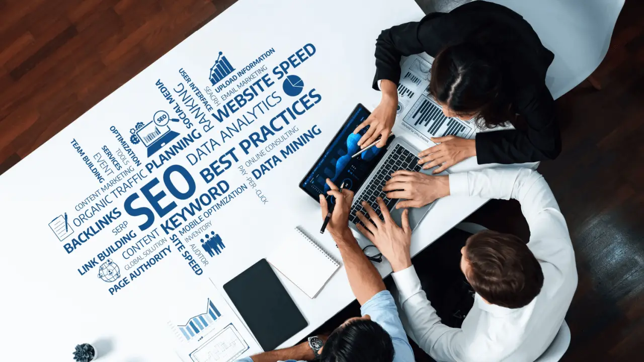 Legal professionals analyzing online reputation SEO for law firms data and analytics on laptop