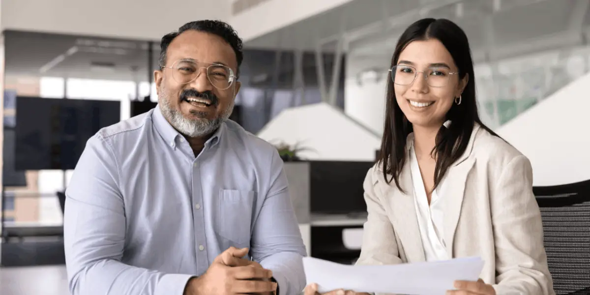 Legal marketing services for law firms consultation between professionals reviewing documents